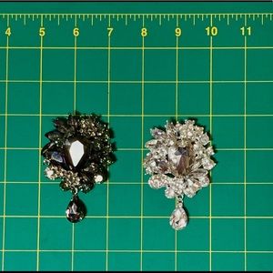 RHINESTONE BROOCHES.